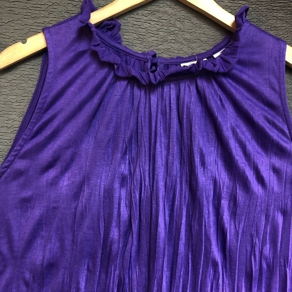 Purple ruffle neck, sleeveless top no brand no size please view measurements